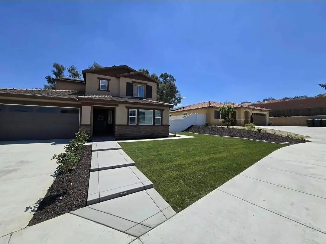 Completed front-yard turf, planting and concrete walkway