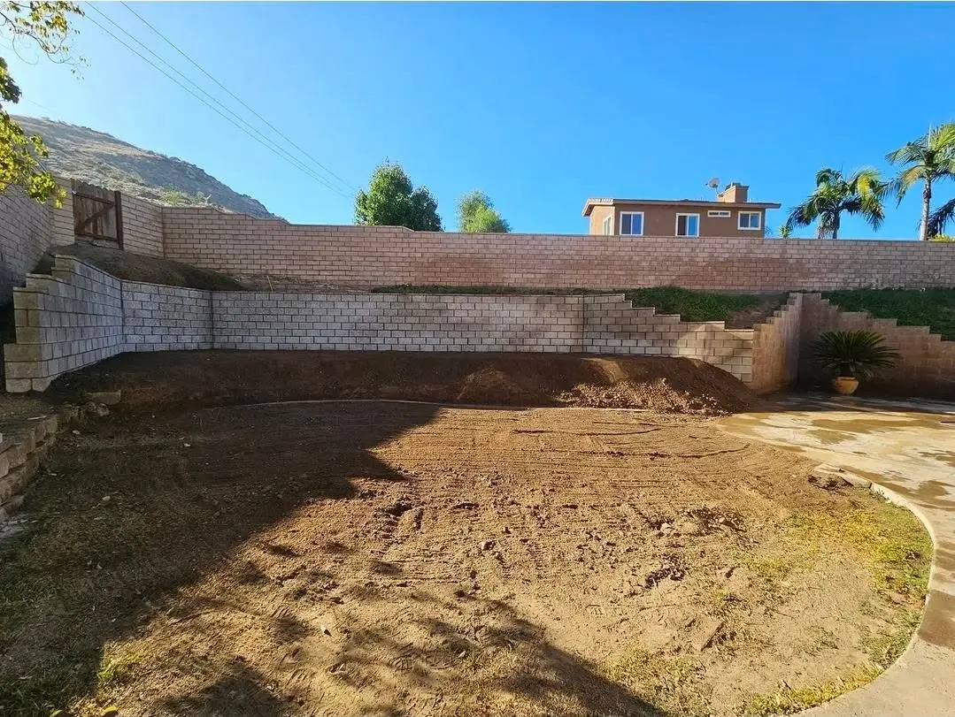Backyard retaining-wall construction in progress
